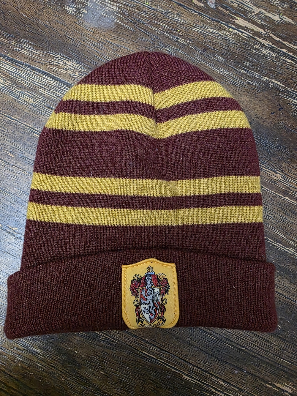 Warner Bros. Maroon and Gold Striped Knit Beanie with Crest Patch
